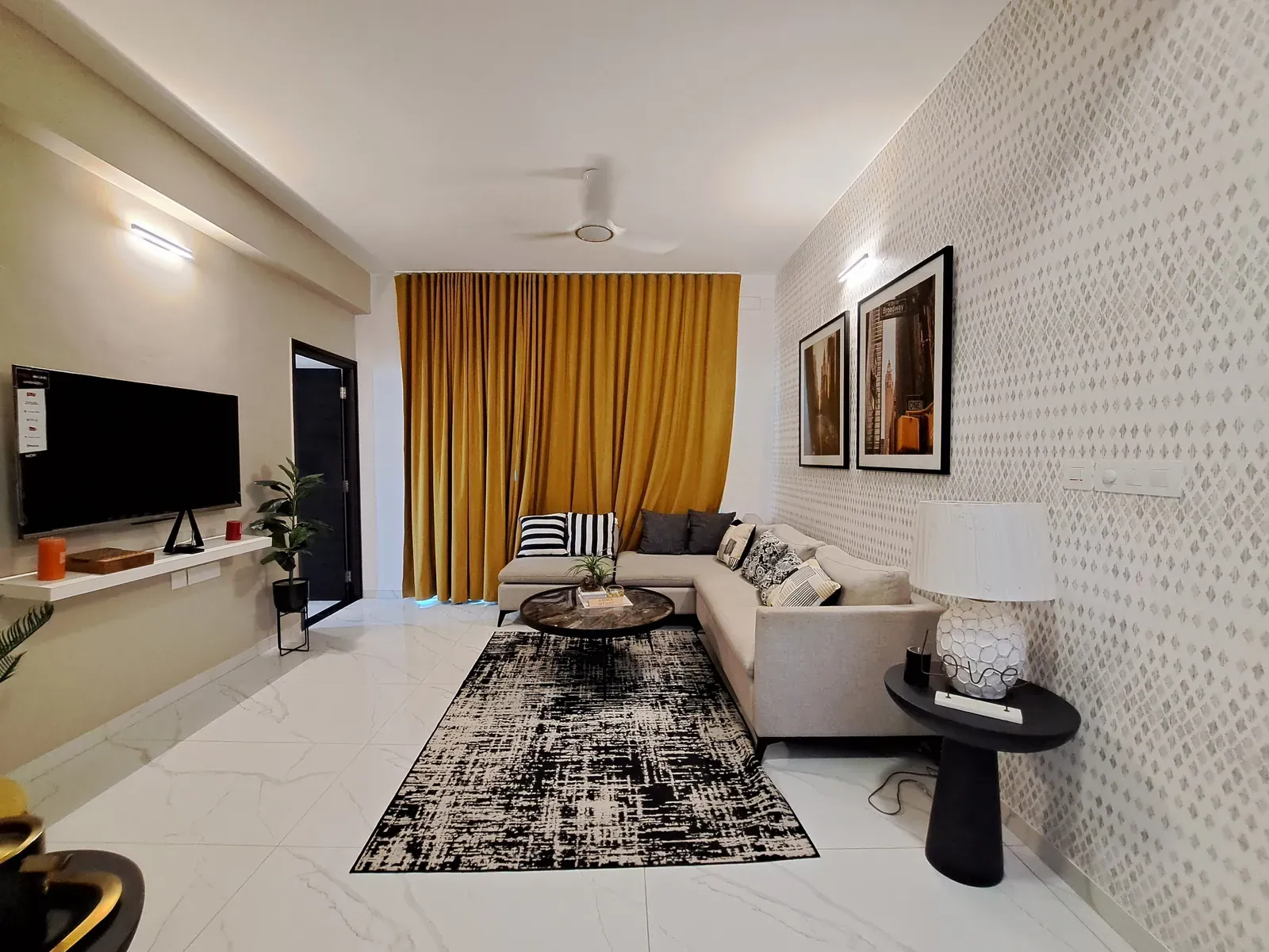 Living room with mustard curtains and a sectional sofa, designed and built by D'tone